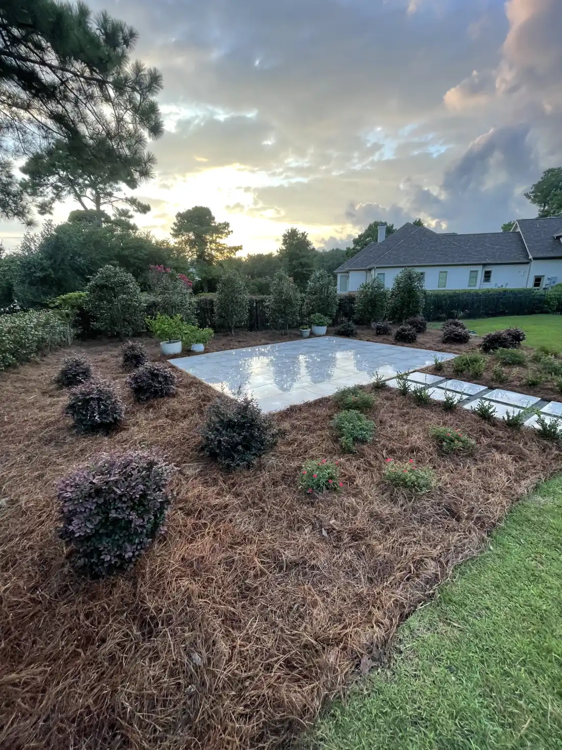 Professional sod installation with grading and soil preparation in coastal NC