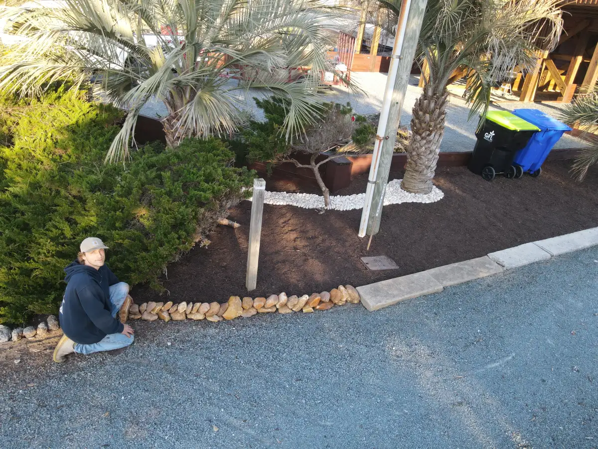 French drain installation with gravel and perforated pipe in Wilmington NC
