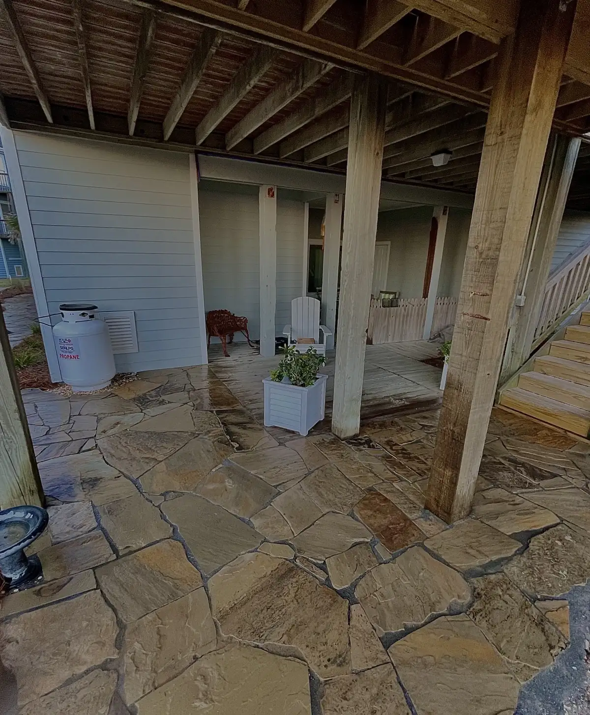 Stone retaining wall with paver walkway in coastal North Carolina